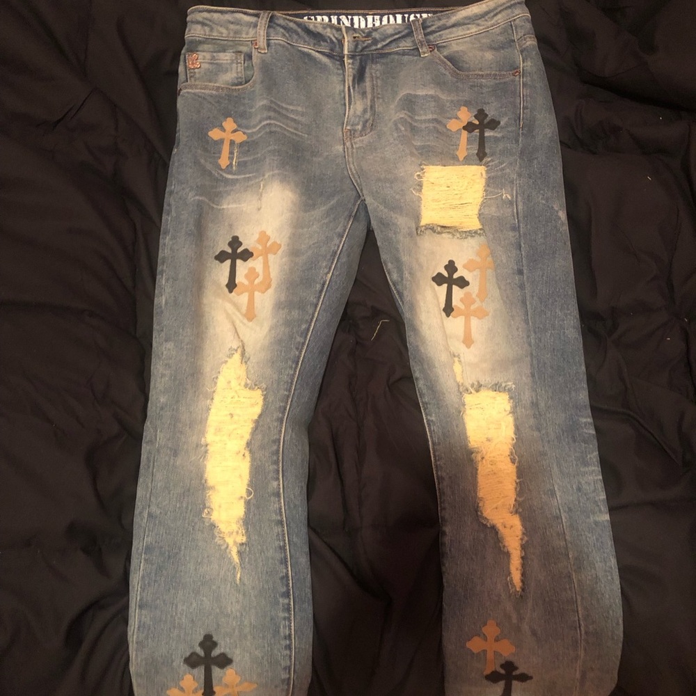 Blue jeans with crosses